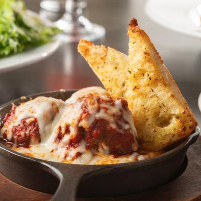 Italian meatballs in Vitale's homemade meat sauce served with garlic bread.
