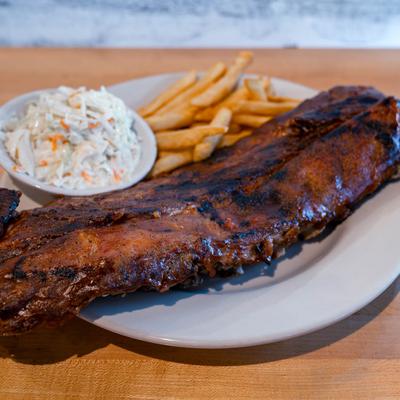 Smoked ribs, with fries, and coleslaw.