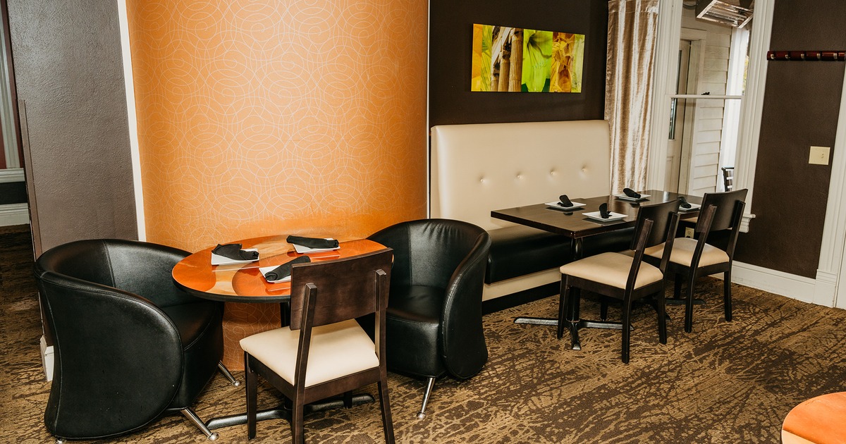 Interior space, cozy dining area with set tables