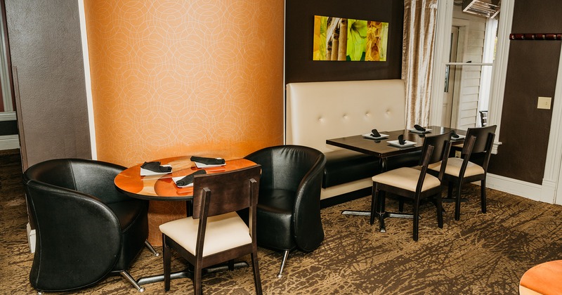 Interior space, cozy dining area with set tables