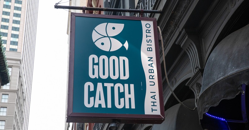 Exterior, sign above entrance, close up