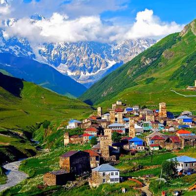 colorful village in Svaneti region of Georgia on green mountain background