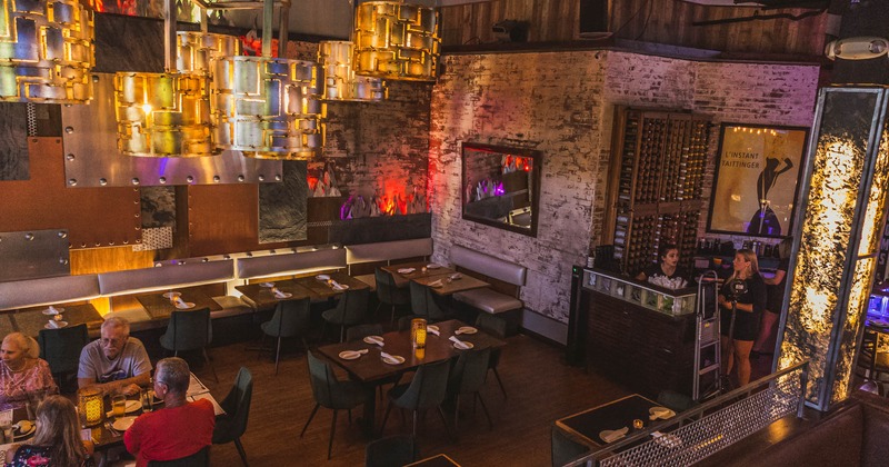 Interior, dining area, guest dining, staff in action