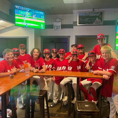 Guests all in sports uniforms of the same team.