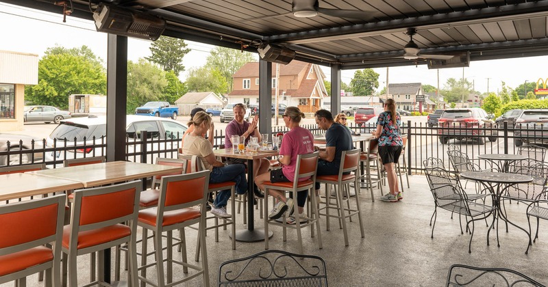 Exterior, patio, main seating area with guests