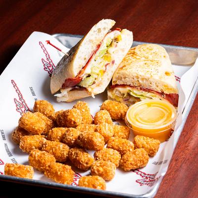 Hot Sicilian Sandwich, and tater tots.