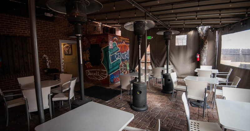 Interior, main dining area with tables and chairs ready for guests