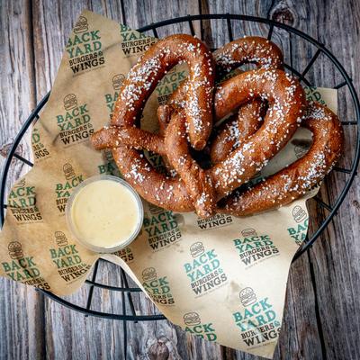 Soft pretzels with cheese dip.
