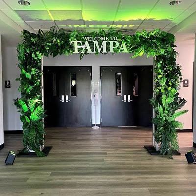 Faux greenery decorated entrance.