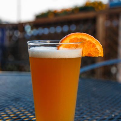 Beer served on table in outdoor seating area