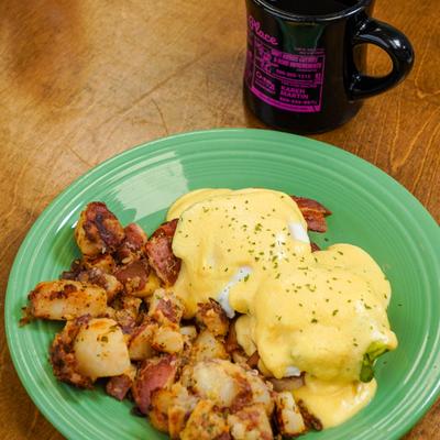 California Eggs Benedict served with home fries.