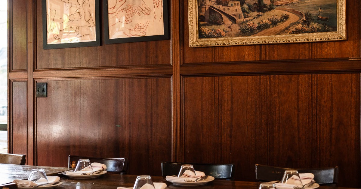 Interior, wooden table with chairs ready for guests