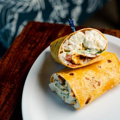 Jalapeno Ranch Wrap sliced in half and served.