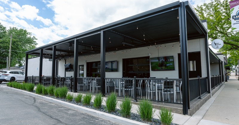 Exterior, angle view to front of reastaurant, terrace, entrance, sign
