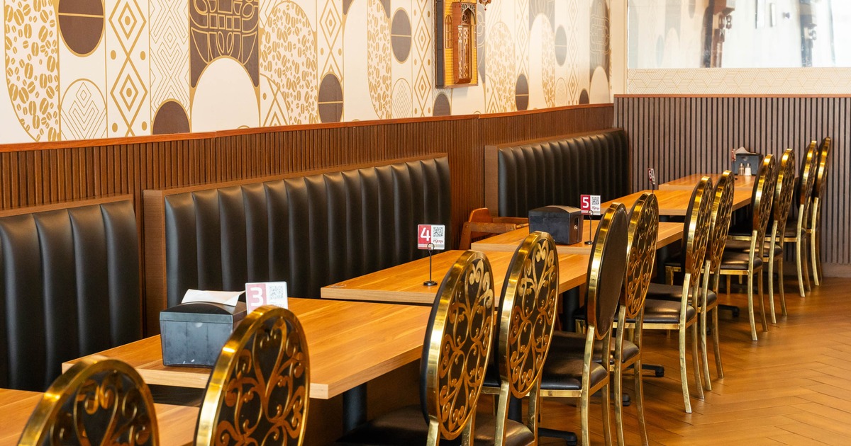 Interior, tables, chairs and wall benches