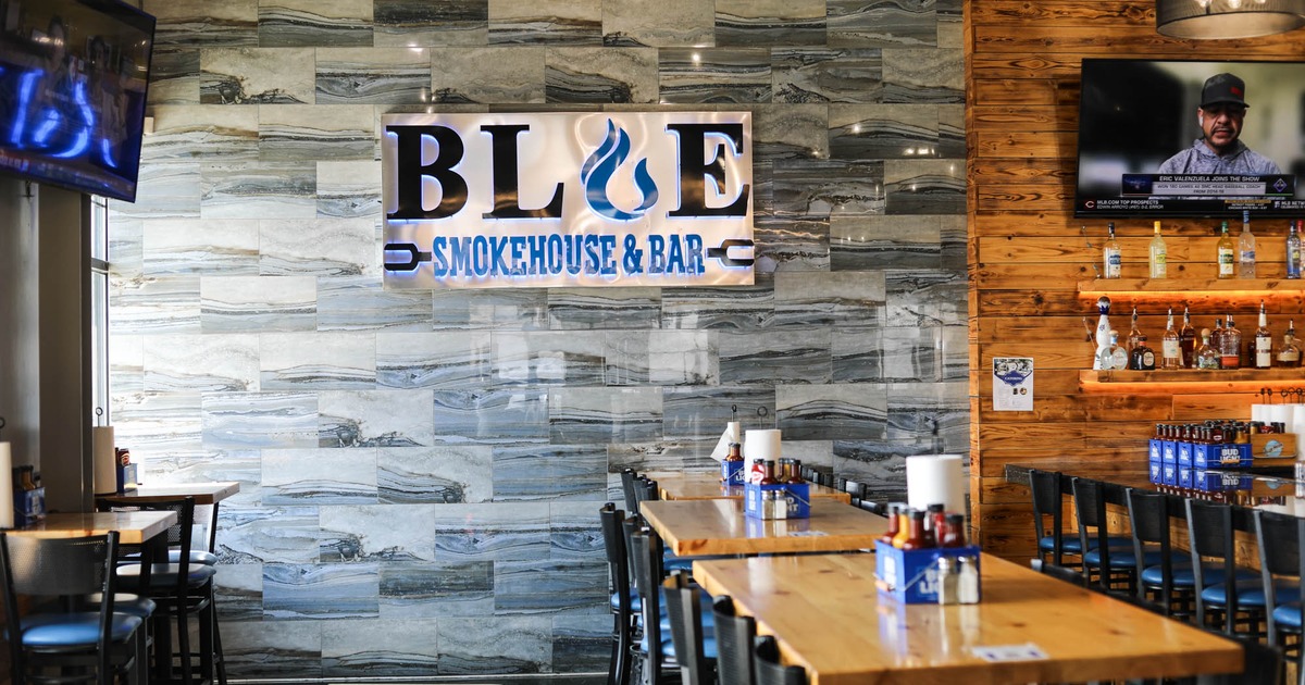 Interior, seating area, logo sign on the wall