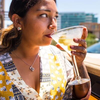 One of guests drinking cocktail