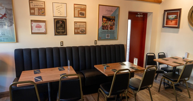 Interior, tables, chairs and high back, black leather bench