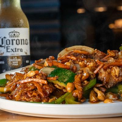 Kung pao chicken and a beer.