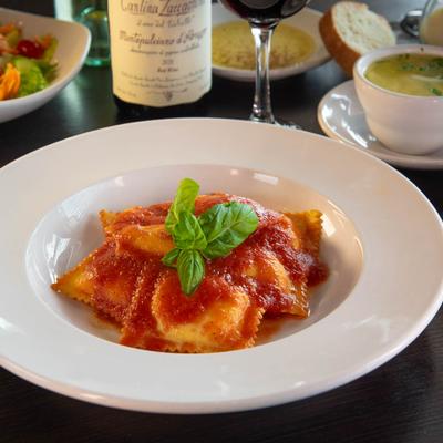 Ravioli with tomato sauce.