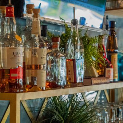 Back bar, shelf with bottled spirits