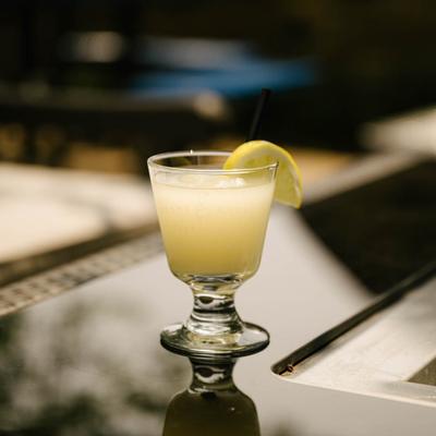 Slush du Jour, served in a glass, front view.