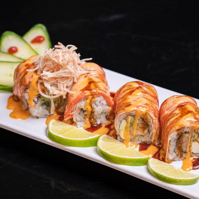 Green Dragon Roll with shrimp tempura and cucumber topped with avocado.