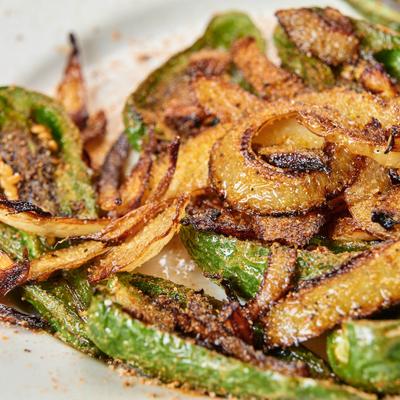Grilled onions and jalapenos, close-up.