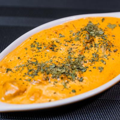 Paneer Tikka Masala topped with dried herbs.