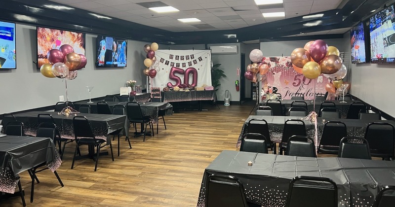 An event room set up for 50th birthday party