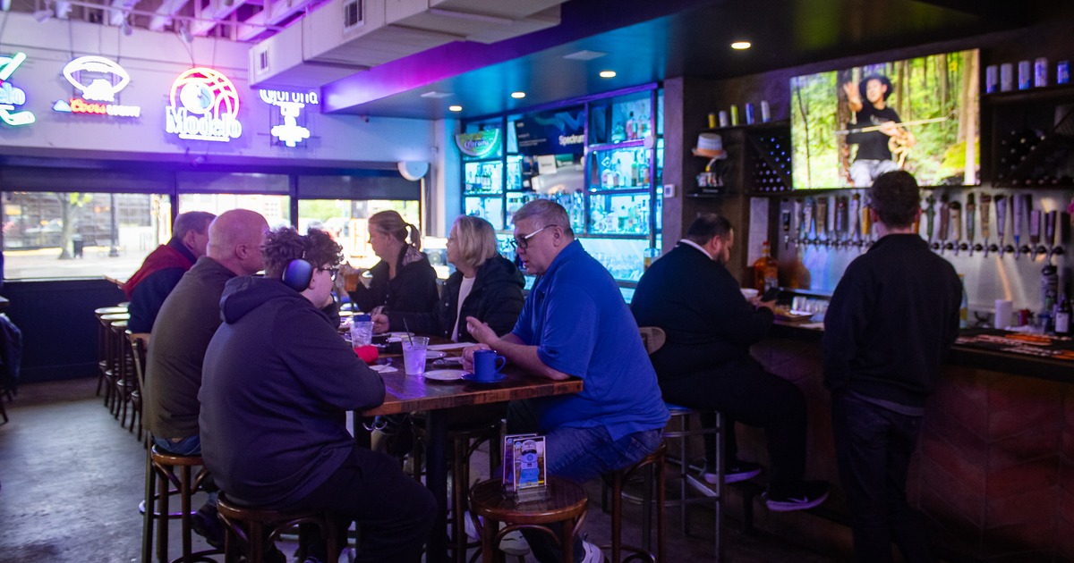 Customers eating and drinking