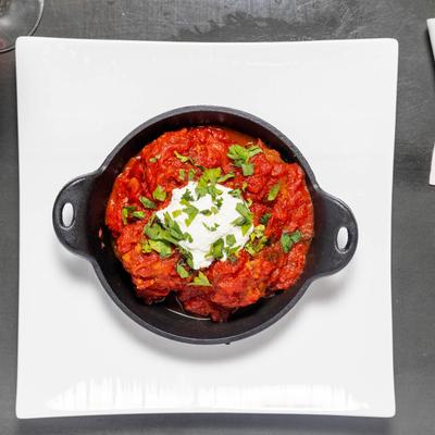 Polpette meatballs with Pomodoro sauce and ricotta cheese.