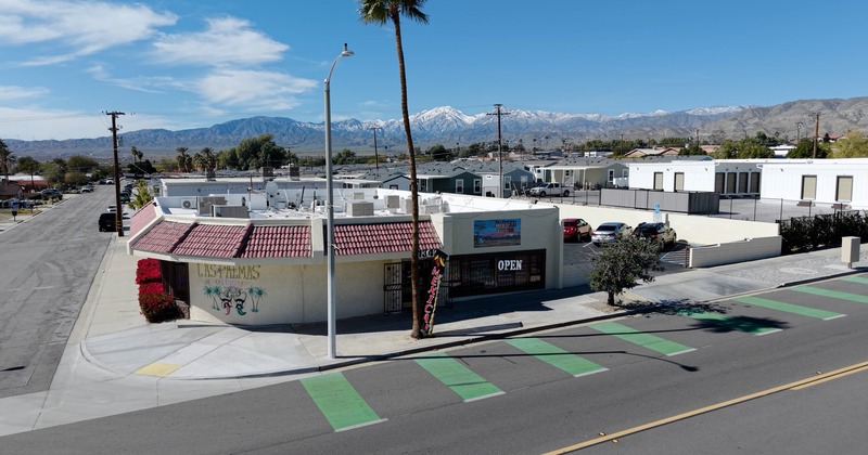 Exterior, aerial view to restaurant and parking lot