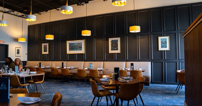 Nicely done interior dining area with set tables