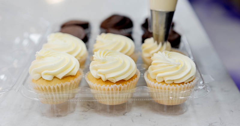 Cupcakes being glazed