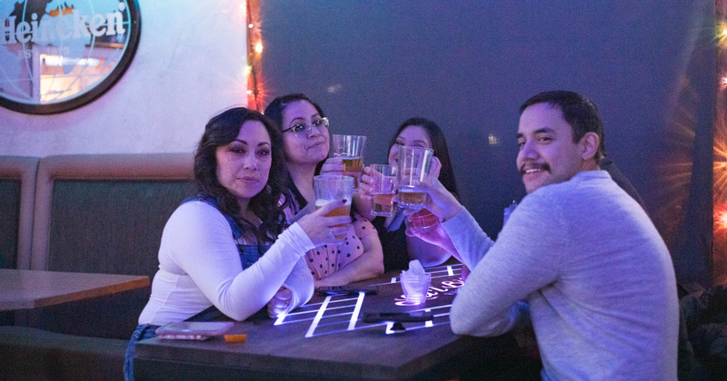 Interior, a DJ in the back playing music