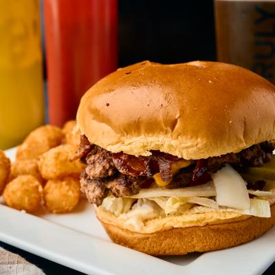 Chip's Smash burger served with tater tots.