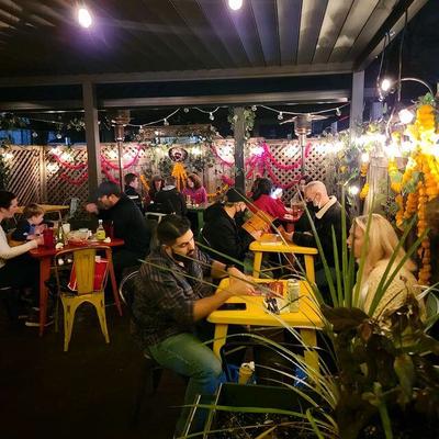 Lots of people on the patio in the evening.