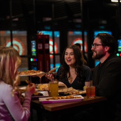 Adults eating and drinking.