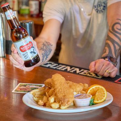 Fish and chips served with beer