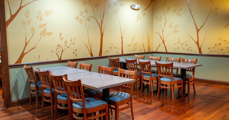 Cozy interior dining area with tables ready for guests