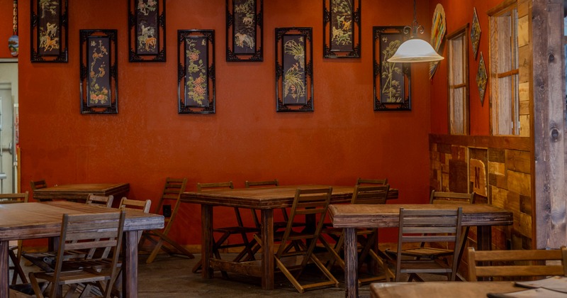 Interior, tables with chairs near the wall
