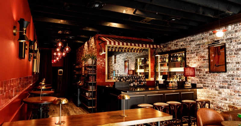 Interior seating area with a bar in the back