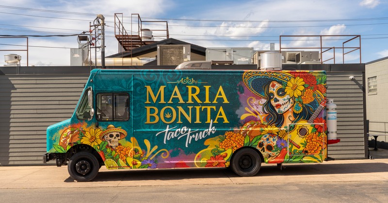 Colorful Maria Bonita Taco Truck parked outside