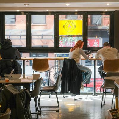 Guests sitting at tables.
