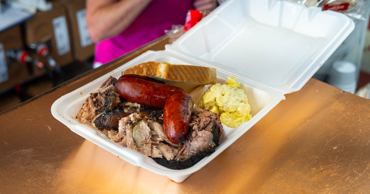 Combo meal with sausage, brisket, potato salad and bread