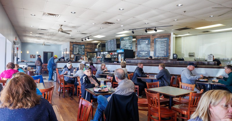 Diner area, tables, chairs, guests