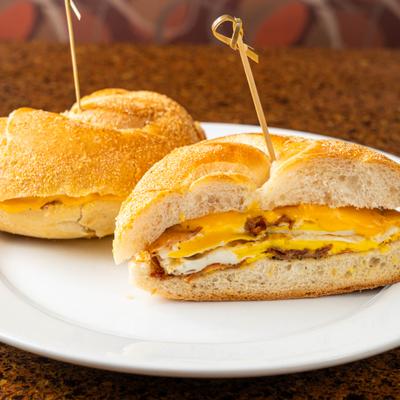 Breakfast sandwich with eggs and cheese.