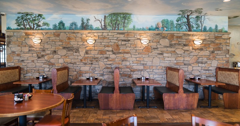 Onterior seating area with a booths in the back