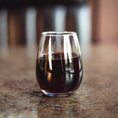 A glass of red wine.